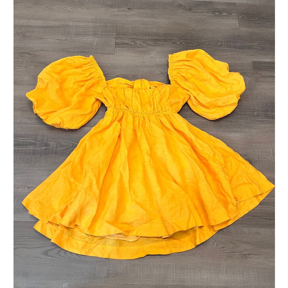 Showpo. Amalie The Label Yellow Linen Tie Back Puff Sleeve Mini Dress